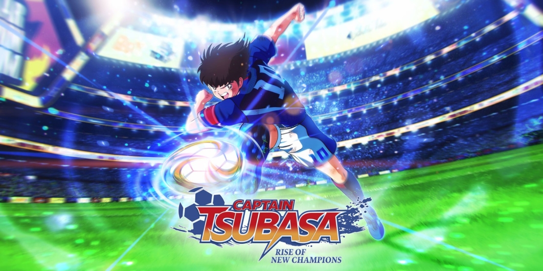 Soccer player in blue and black jersey jumps with ball in the air inside a stadium