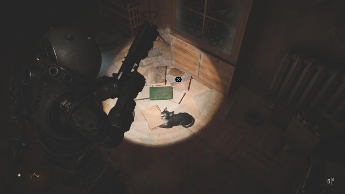 A character in a dark armored suit holds a weapon, casting light on a black cat lying on scattered papers in a dimly lit room from 'Cronos: The New Dawn'.