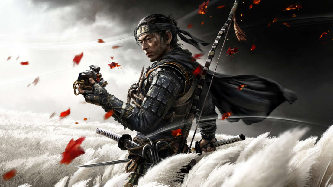 A samurai in traditional armor stands in a field of tall grass holding a sword with a black cape flowing in the wind surrounded by falling red leaves