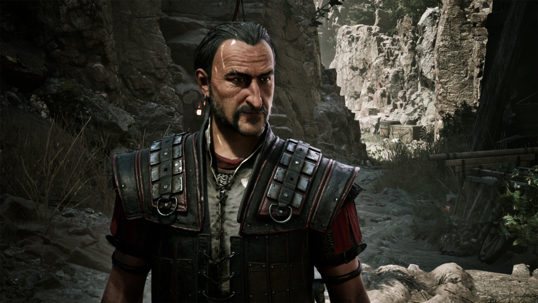 Gothic 1 Remake tips: Man in dark armored clothing standing in rocky canyon