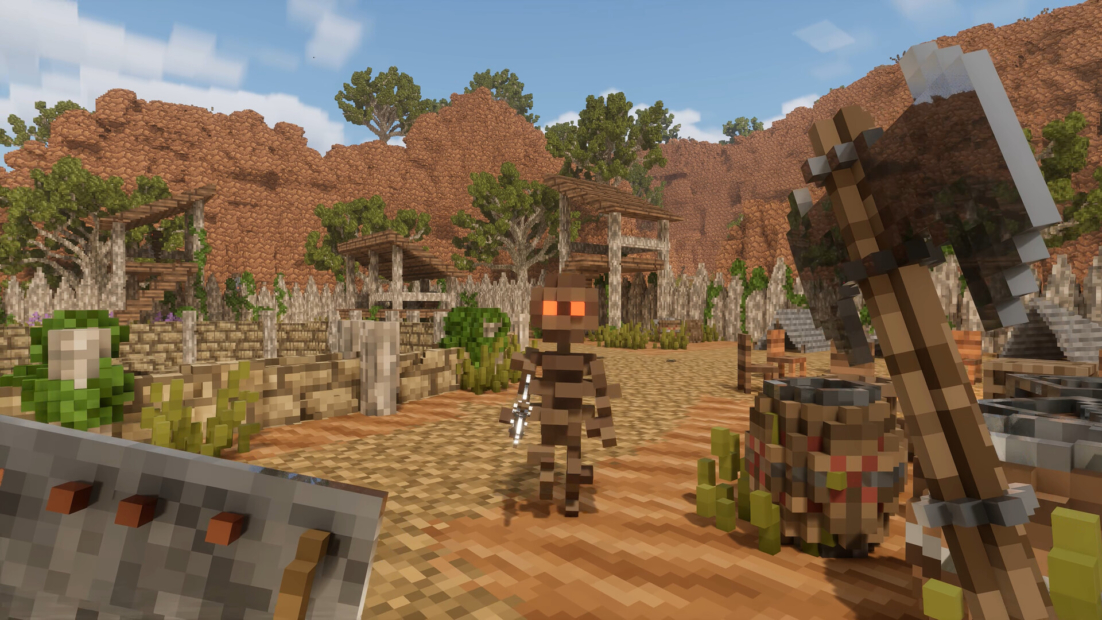 Game-Charakter mit orangefarbenen Augen steht in einer von Felsen umgebenen Siedlung mit Bäumen und Holzhäusern