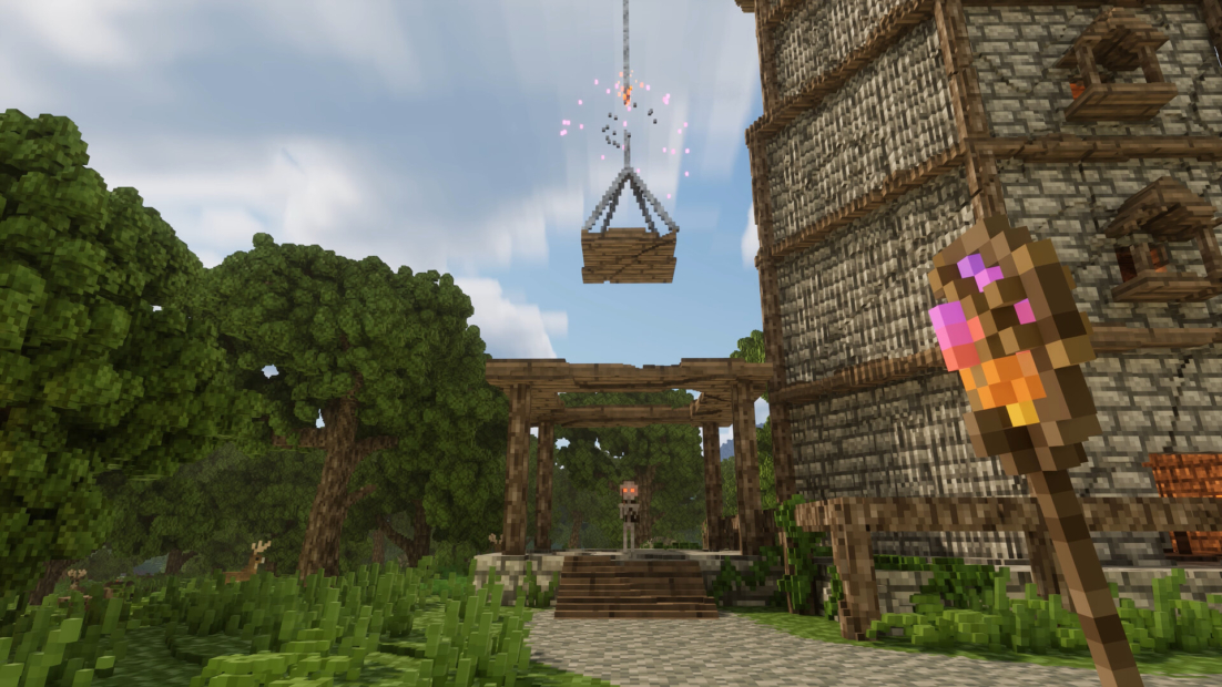 Lay of the Land-Szene mit einem hölzernen Galgen, einem hängenden Kasten, einem Spieler mit Fackel in der Hand und einem großen Steinturm im Hintergrund.