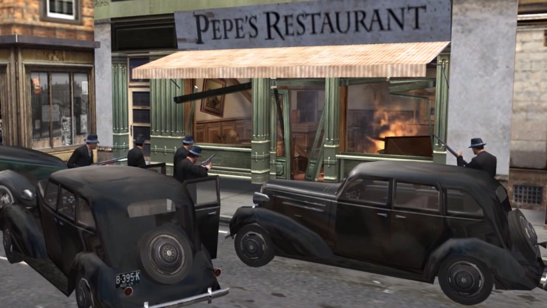 Four men in suits and hats are aiming guns outside Pepe's Restaurant, with two vintage black cars parked nearby in a 1930s city setting from the 2002 Mafia game 