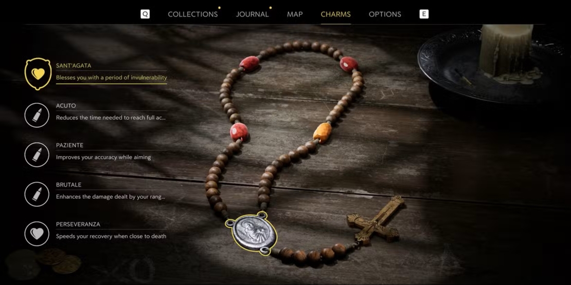 Das Amulett-Menü aus „Mafia: The Old Country“ zeigt einen hölzernen Rosenkranz mit einem Medaillon und einem Kreuz und listet fünf Amulette auf: Sant'Agata macht unverwundbar, Acuto verkürzt die Nachladezeit, Paziente verbessert die Zielgenauigkeit, Brutale erhöht den Schaden und Perseveranza beschleunigt die Erholung kurz vor dem Tod.