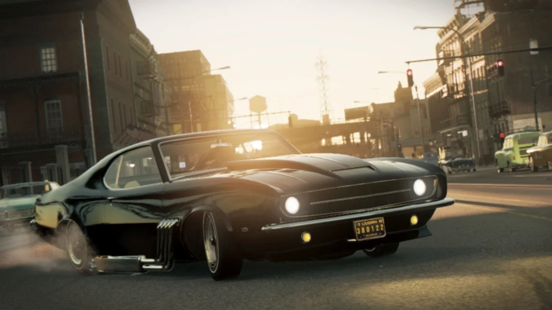 Black vintage muscle car driving on a city street at sunset in the game Mafia III