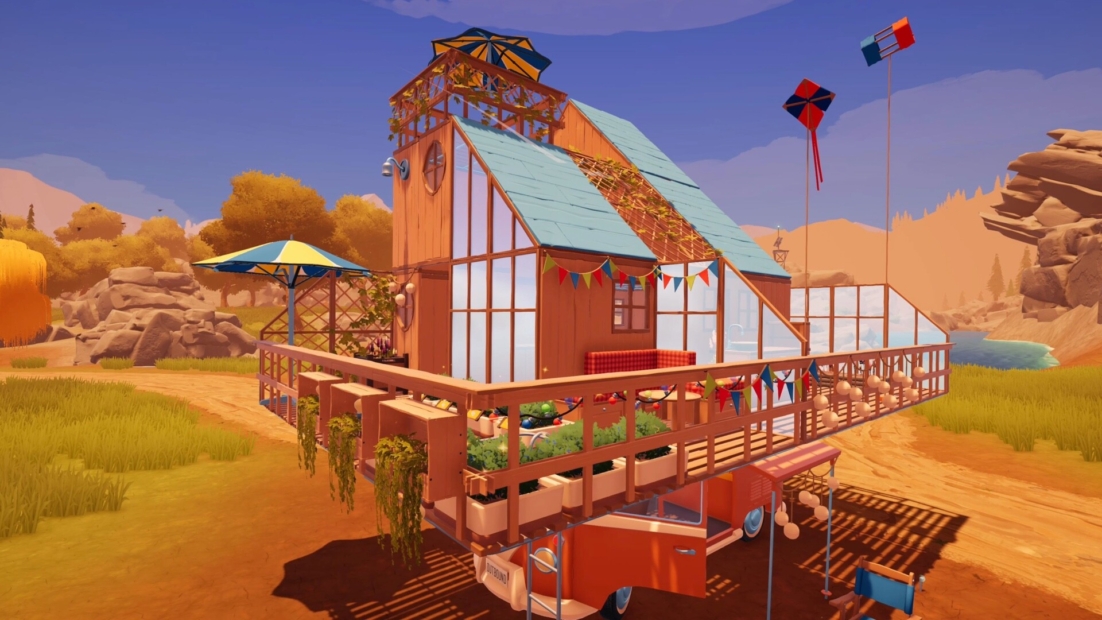 Outbound Tips: House with large balcony, sun umbrella, and two kites in a rocky landscape