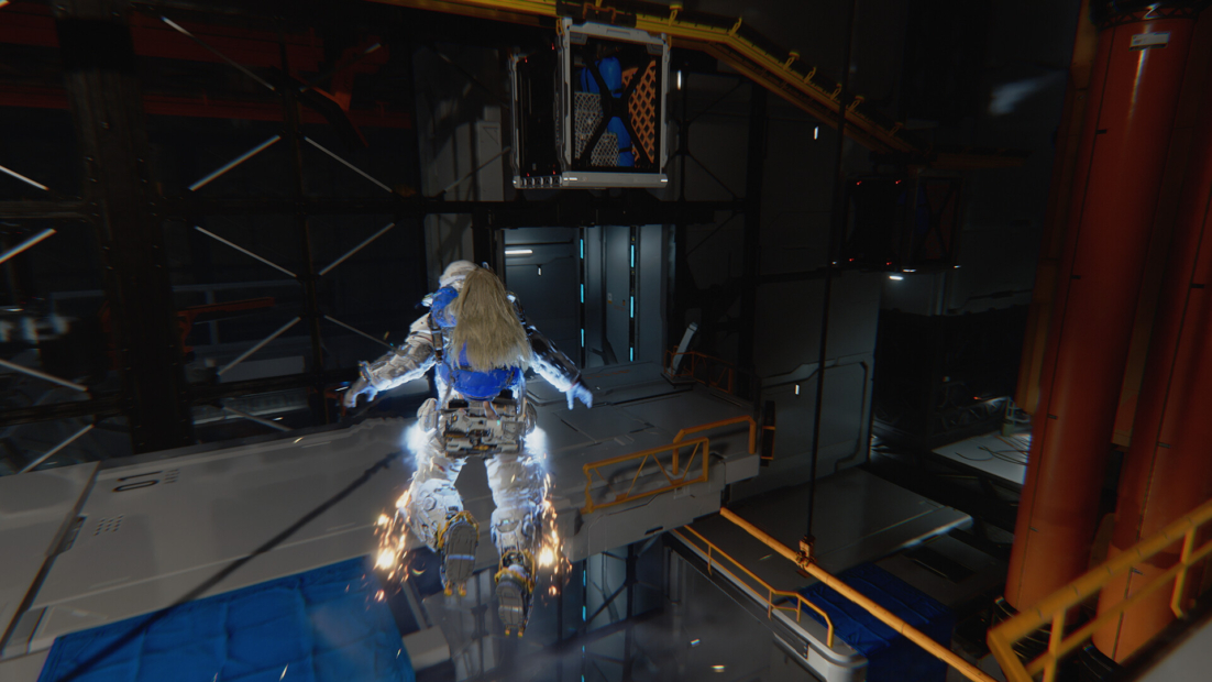 Robot with glowing limbs and sparks at its feet inside an industrial hall