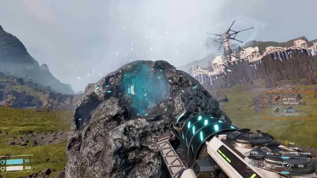 View of a rocky landscape with a glowing blue crystal-like inclusion and a futuristic device in the foreground.