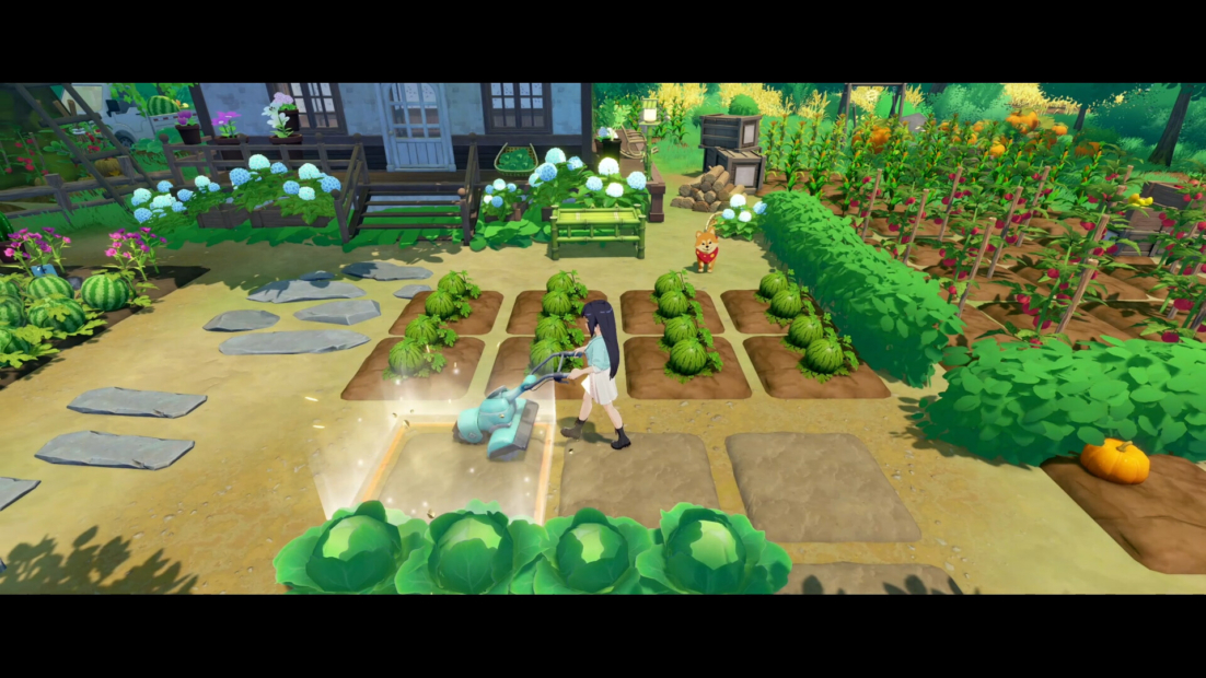 Garden with various vegetable plants, two people watering and tending the beds, surrounded by bushes and a wooden house in the background