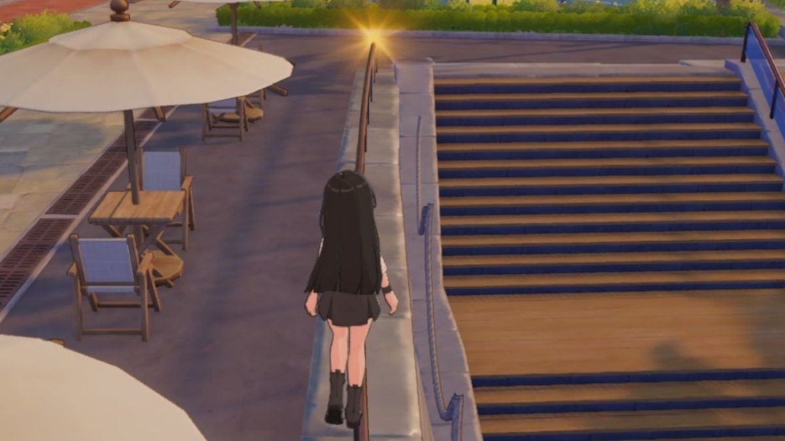 Person with long black hair and black clothing standing on a bridge next to stairs and umbrellas