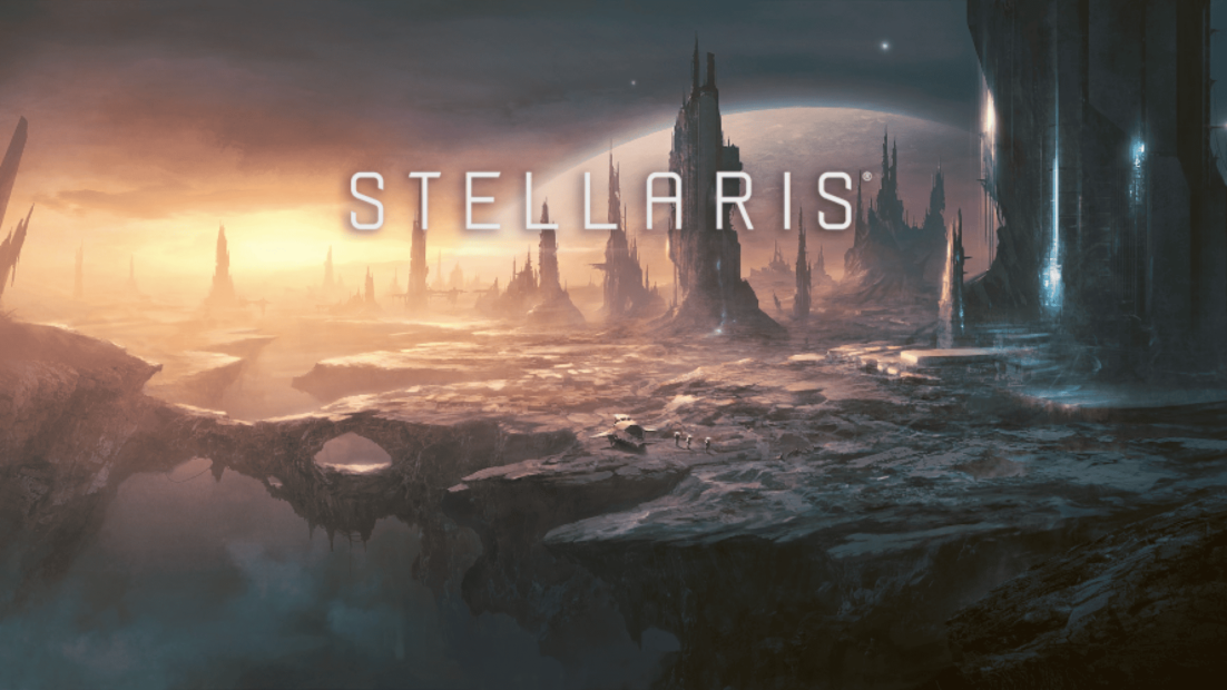 Futuristic landscape with tall pointed rock formations and the word 'STELLARIS' in the sky