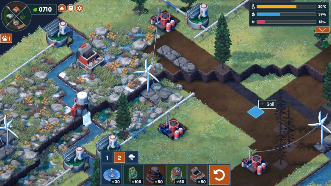Gameplay scene from Terra Nil showing a landscape restoration with water flow, wind turbines, and soil tiles being placed near rocky terrain and vegetation