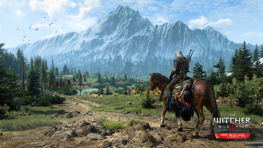 Witcher 3 Tips: Rider with two swords on his back on a brown horse overlooking a vast landscape with forests, a river, and snow-capped mountains in the background.